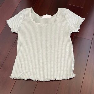 Light sage coloured top. Super pretty and elegant.